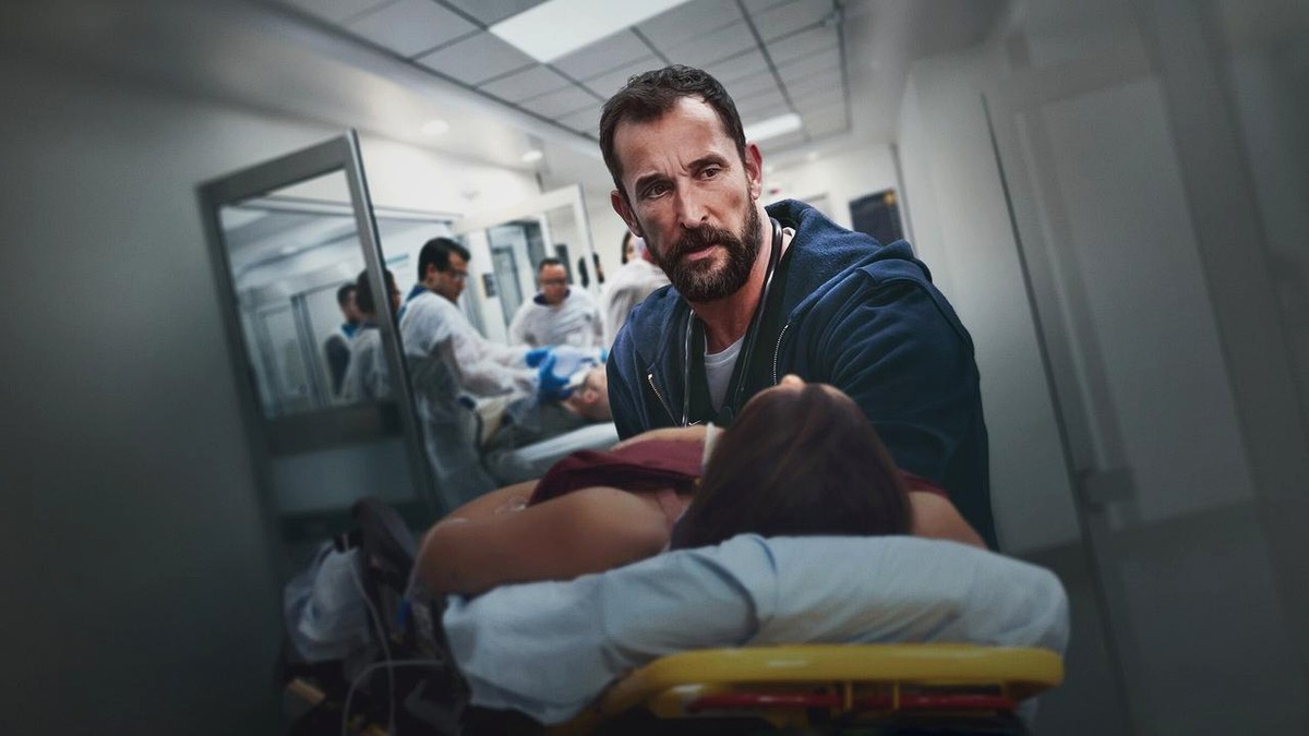Noah Wyle as Dr. Robby — competence on the floor, accumulated damage underneath